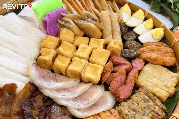 A delicious and visually appealing platter of vermicelli with tofu and shrimp paste at Bun Dau Mam Tom.