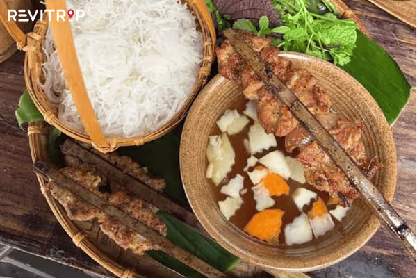 The ingredients that make up a bowl of Bun Cha.