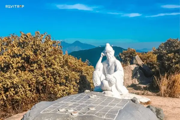 Ban Co Peak Summit With the De Thich Statue in Da Nang