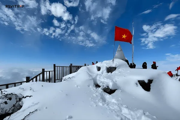 Fansipan summit covered in snow in winter with white mountain landscape