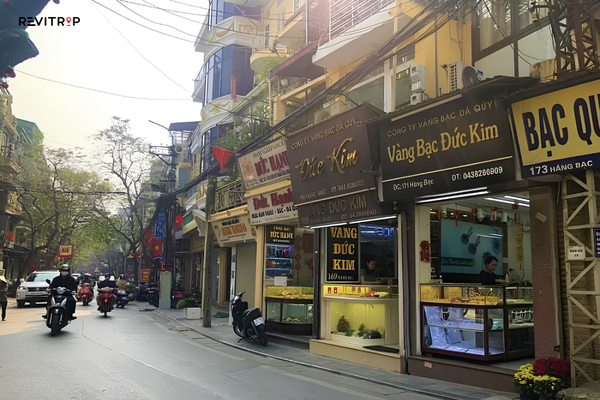 Jewelry shops and motorbikes along Hang Bac Street in Hanoi Old Quarter