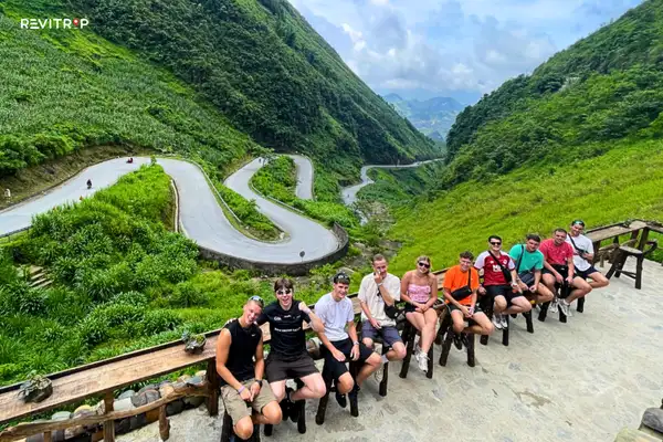 Travelers at a Scenic Ha Giang Loop Viewpoint