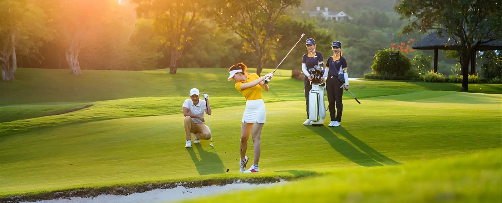 Golfers playing on a scenic golf course in Vietnam surrounded by lush greenery